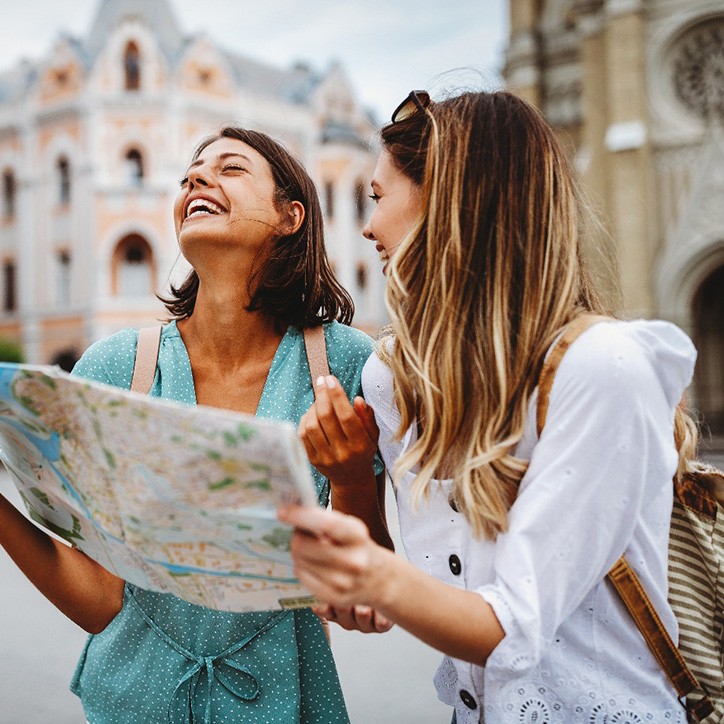 Long Beach veneers patient smiling with friend