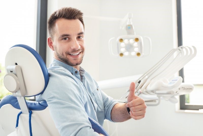 patient visiting their dentist and smiling 