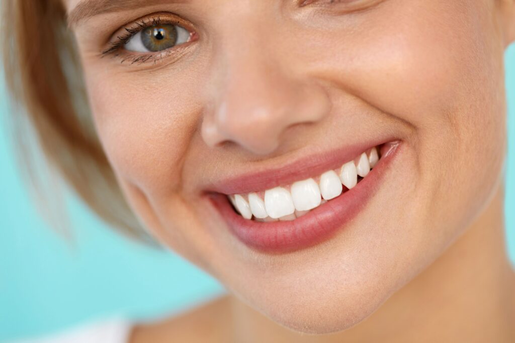 Closeup of woman with hazel eyes smiling